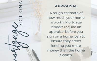 A notebook on a table with the words mortgage appraisal.